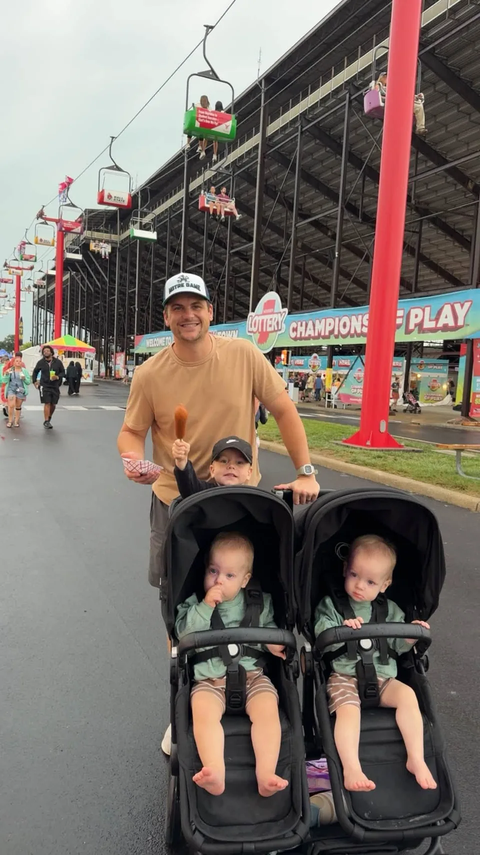 Kinnon with Leland, Sutton, and Tatum at a state fair